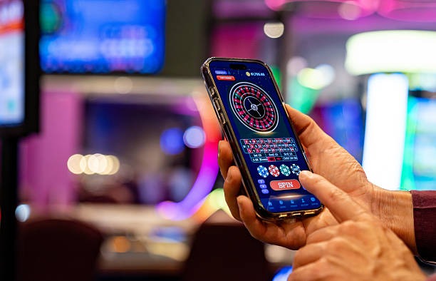 kkslot777 mobile app with live score ticker and betting slip side by side